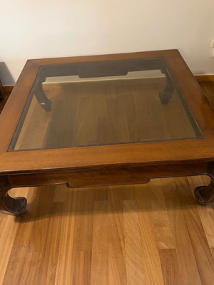 Coffee table made of solid walnut with glass top like new