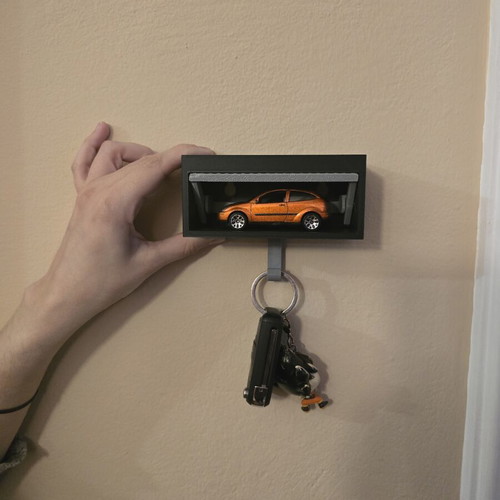 3D printed wall mount hanger with car display and lifting door