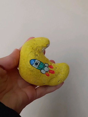 Painted stone new with acrylic colors and glossy varnish