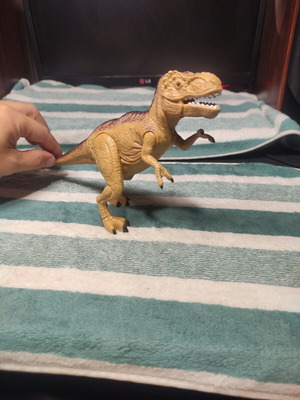 Tyrannosaurus Rex toy used with light and sound