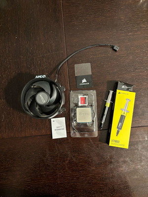Ryzen 34100 μεταχειρισμένο με θερμική πάστα Corsair και κάρτα CPU