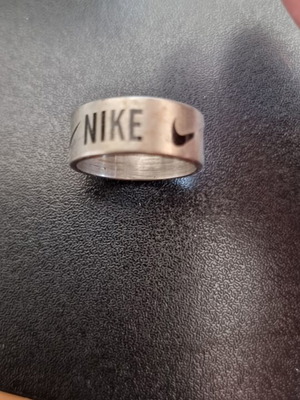 Nike steel ring like new