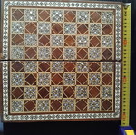 Handmade chess with mother-of-pearl and ancient Egyptian figures used