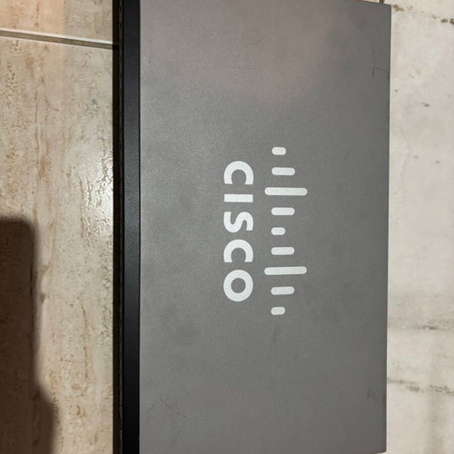 Cisco SF250 48port switch used with 2 gigabit ports and 2 SFP slots