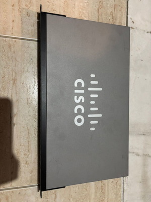 Cisco SF250 48port switch used with 2 gigabit ports and 2 SFP slots