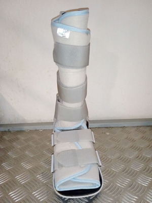 Ankle Boot Brace used with removable foam padding and adjustable straps