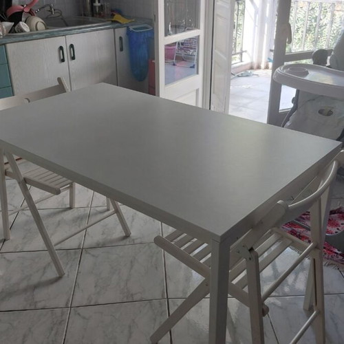 IKEA white dining set with 4 folding chairs