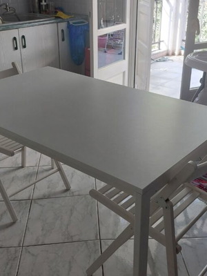 IKEA white dining set with 4 folding chairs