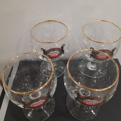 Amstel Bock beer glasses set of 4 with gold rim like new