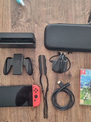 Nintendo Switch OLED конзола като нова с Zelda BOTW и калъф