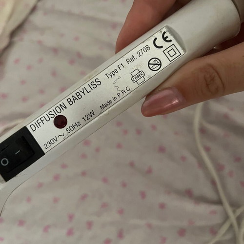 Babyliss curling iron used with ions