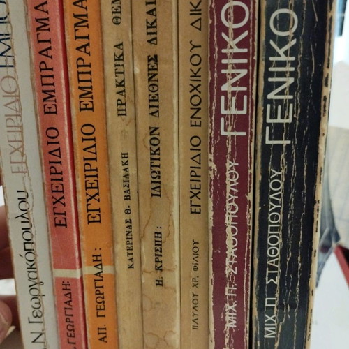 Legal books used pack on obligations, international and commercial law