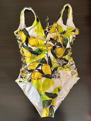 One-piece women's swimsuit used with lemon print and cut out design size M