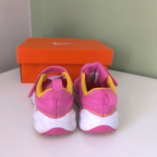 Nike Revolution 7 kids athletic shoes used, size 25, fuchsia