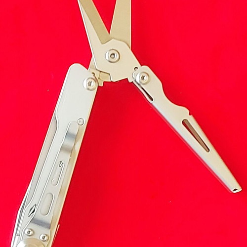 Multitool new with large scissors, knife, and double-tip screwdriver