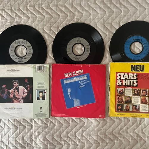 45 RPM record collection like new, lot of 14 discs