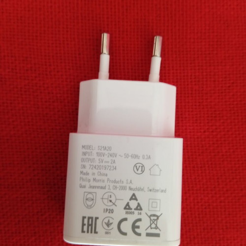 Iqos charger model S21A20 like new, white power adapter