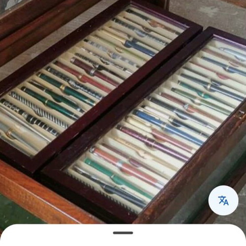Display table with collectible pens like new, mahogany wood