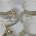 Porcelain tea set like new with gold border 5 cups, 5 saucers, tray