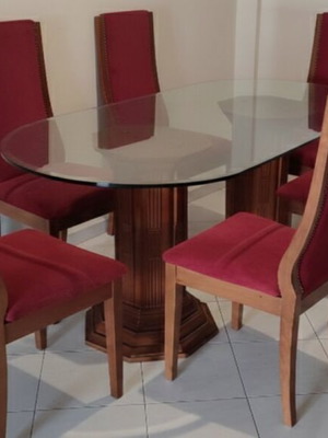 Dining table and chairs like new with anigre cherry wood bases