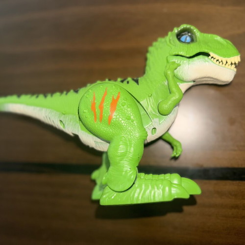 Dinosaur toys set of 3, like new, battery operated and rubber