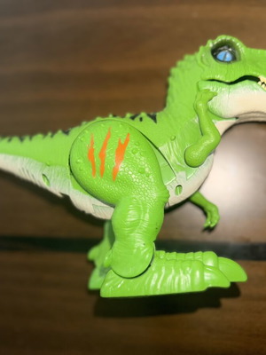 Dinosaur toys set of 3, like new, battery operated and rubber