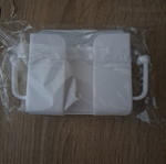 White wall-mounted plastic holder organizer for mobile phone or remote