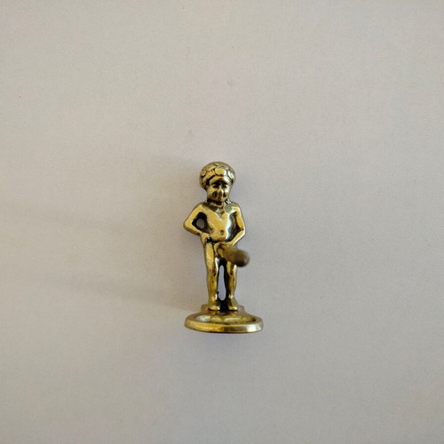 Brass corkscrew opener used with minor metal wear