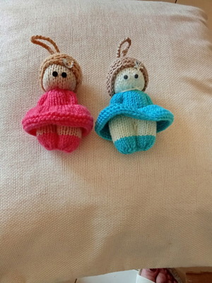 Knitted dolls pair handmade with needles