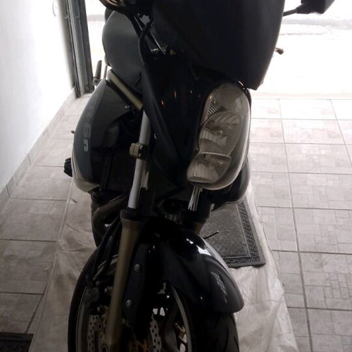 Kawasaki ER6 650cc motorcycle, 66000km, leather accessories