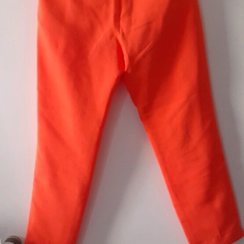 Selestino orange pants size M like new with two front pockets