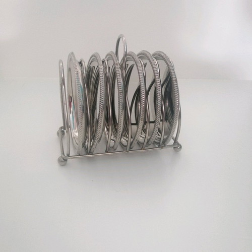 Vintage silver coaster set with elegant stand, like new