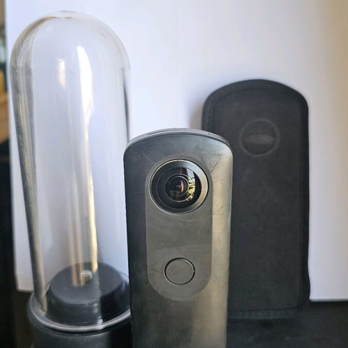Ricoh Theta S camera used with waterproof and fabric case