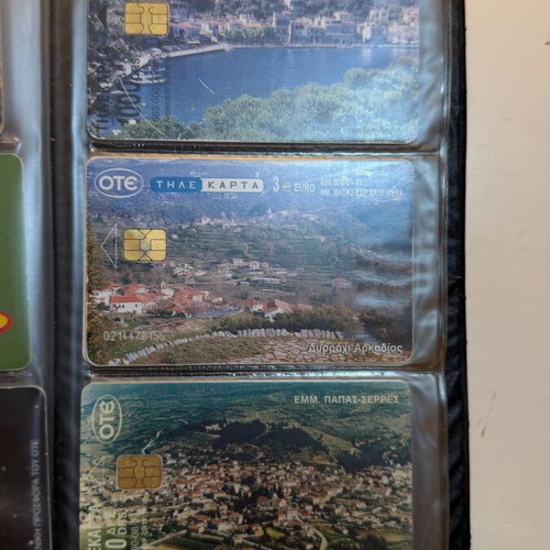 Vintage OTE phone card collection in black album