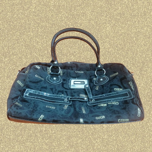 Guess vintage black handheld bag used with silver and gold details