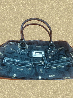 Guess vintage black handheld bag used with silver and gold details