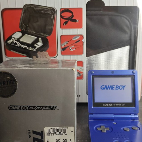 Nintendo Game Boy Advance SP blue with box and travel pack