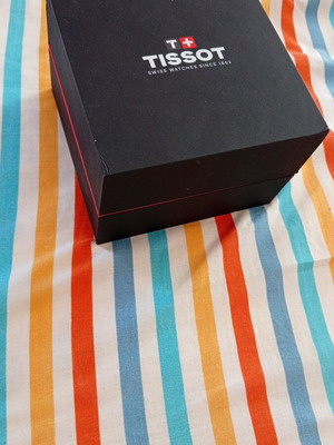 Tissot watch new with light blue dial and steel bracelet