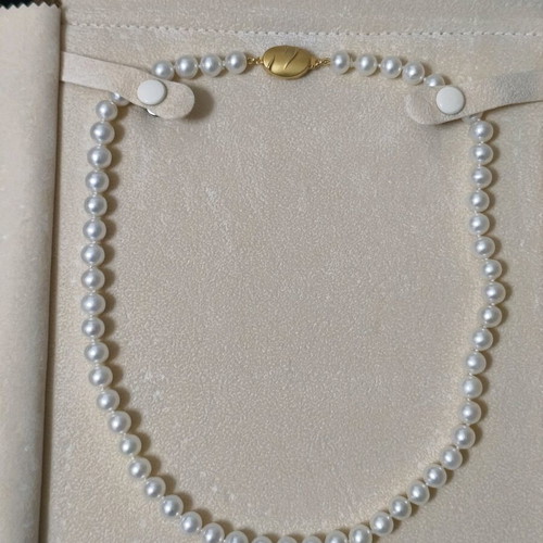 Pearl necklace new with 14K gold clasp