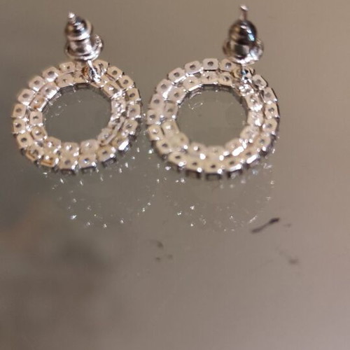 Silver earrings new with small zircons