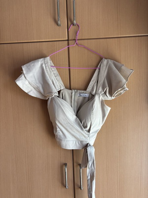 Zark beige top with asymmetric design and built-in bust support