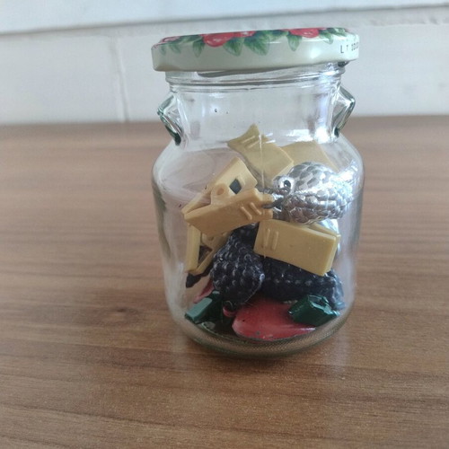 Jar with various tablecloth clips set of 12 like new