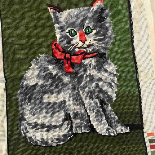 Handmade framed textile painting used with green background