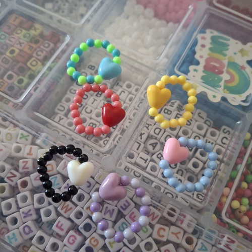 Elastic beaded ring with heart charm