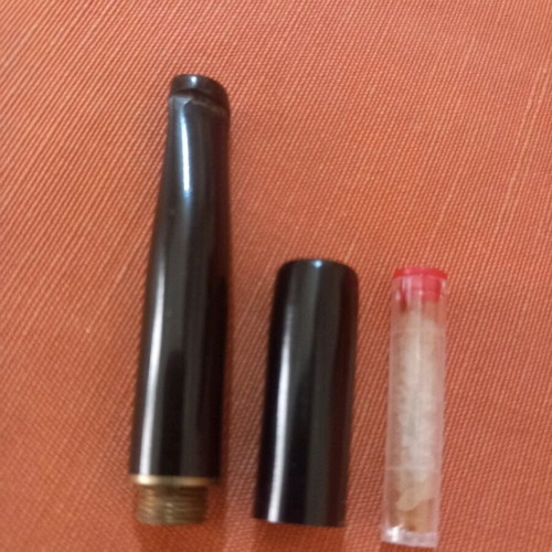 Cigarette holder used for regular cigarettes, not slim
