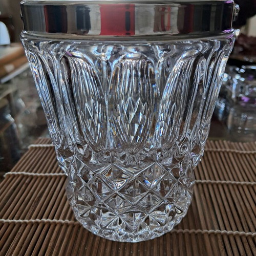 Vintage crystal ice bucket used with stainless steel rim and handle