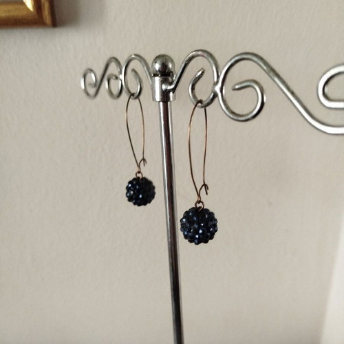Earrings used with blue crystal balls