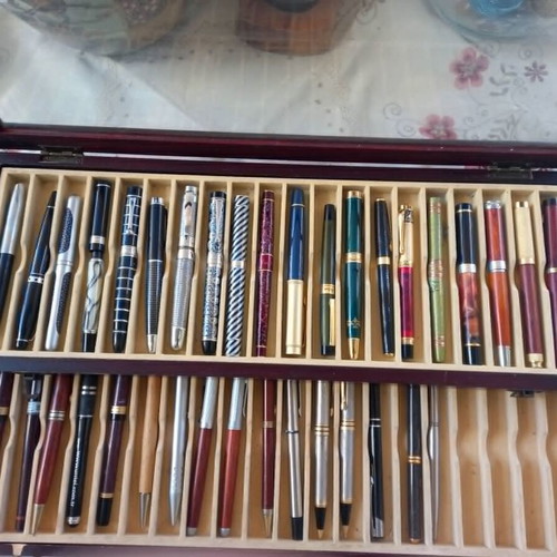 Collectible pens set of 36 with wooden case like new