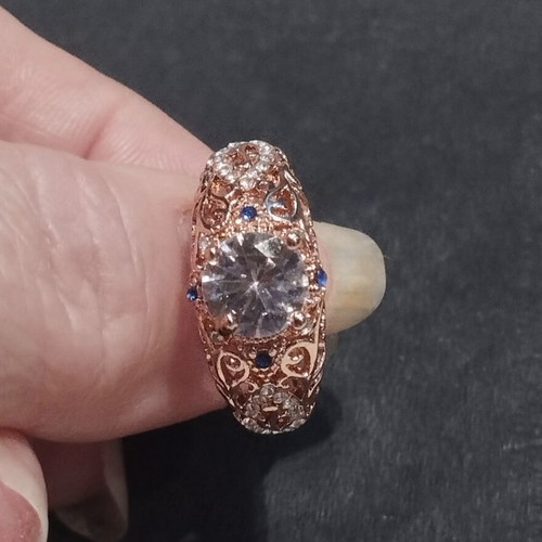 Elegance rose gold ring with white and blue stones