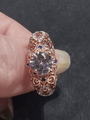 Elegance rose gold ring with white and blue stones